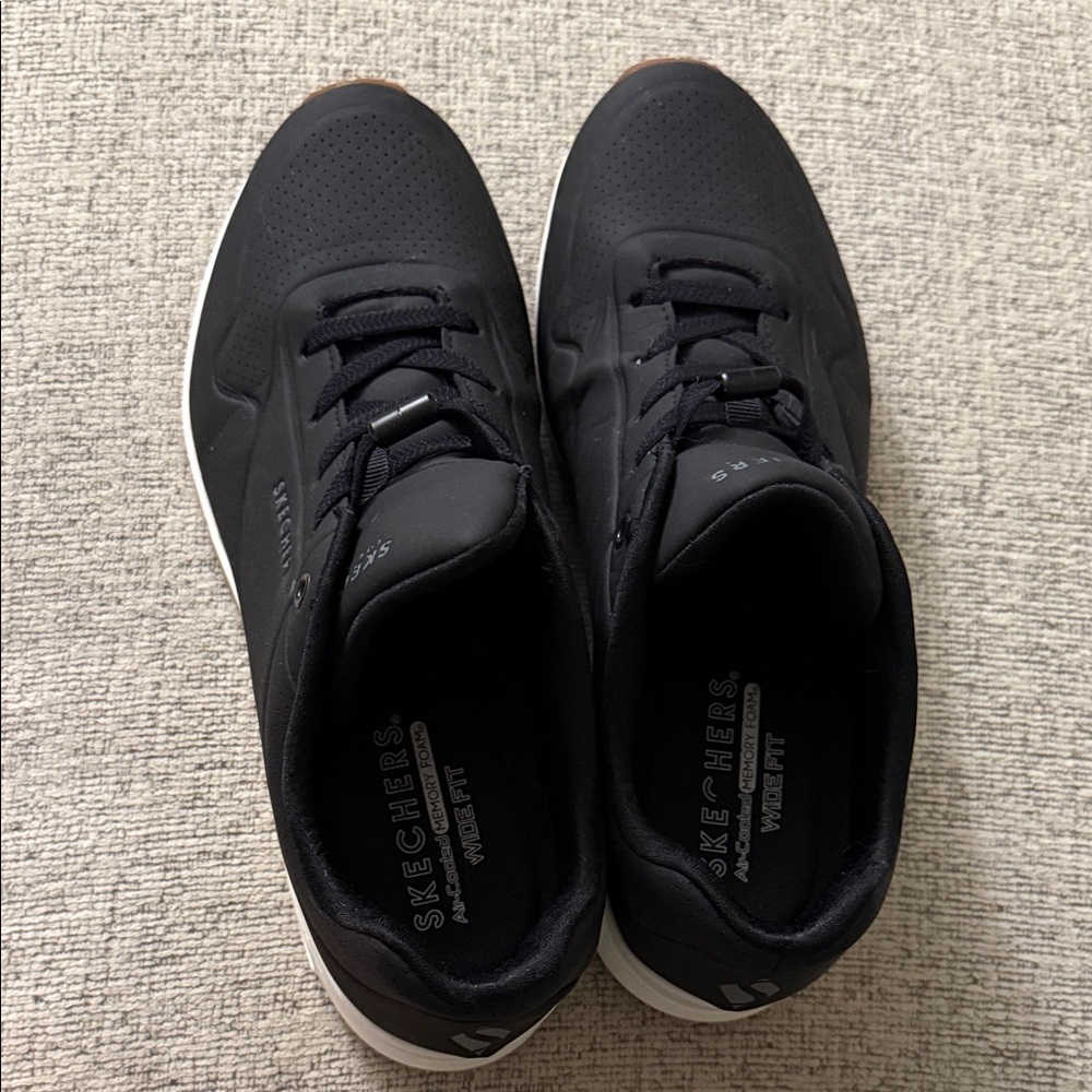 Skechers UNO Women's Black Athletic Shoes with White Sole